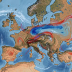 Carte météorologique réaliste de l’Europe montrant des masses d’air maritimes et continentales, des fronts colorés et des bandes nuageuses.